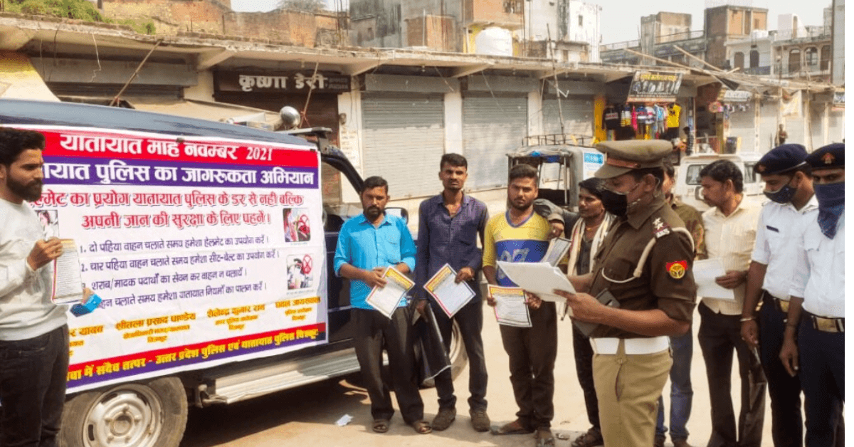 Traffic police spread awareness by distributing pamphlets